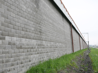 Muri a blocchi rinforzati con geogriglie Sistema tenax T-Block